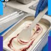 Espatula plastica de 21cm marca Anión para servir helado en Shopping del Heladero, Zona Sur, Buenos Aires.